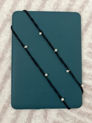 Amazon Kindle Paperwhite 16GB (newest model) ?C Our fastest Kindle ever. with new 7 glare-free display. and weeks of battery life ?C Without lockscreen ads ?C Black photo review